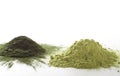 Spirulina and barley grass raw powder on white background Ã¢â¬â heap. Royalty Free Stock Photo